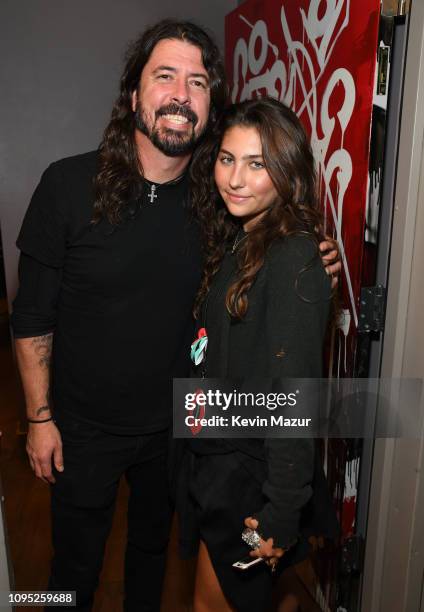 Dave Grohl and Toni Cornell pose backstage during I Am The Highway: A Tribute To Chris Cornell at The Forum on January 16, 2019 in Inglewood,...