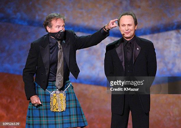 Robin Williams appears on stage with gas mask with Billy Crystal; "On Stage at the Kennedy Center: The Mark Twain Prize" will air November 21, at 9...