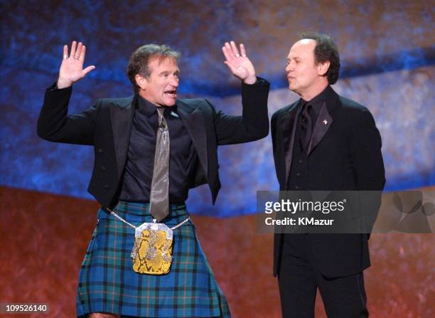 Robin Williams appears on stage with gas mask with Billy Crystal; "On Stage at the Kennedy Center: The Mark Twain Prize" will air November 21, at 9...