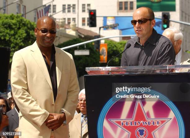 John Singleton & producer Neal Moritz during Director John Singleton Honored with a Star on the Hollywood Walk of Fame for His Achievements in Film...