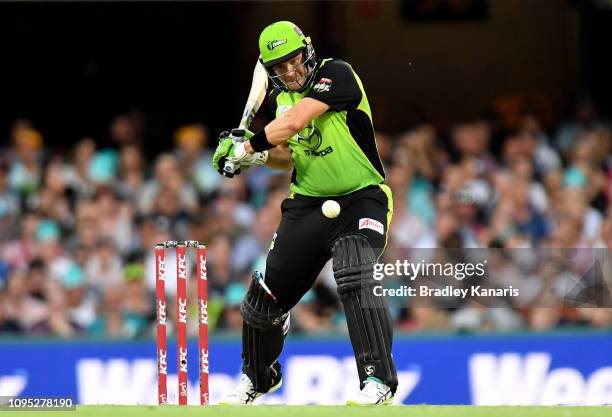 Shane Watson of the Thunder plays a shot during the Big Bash League match between the Brisbane Heat and the Sydney Thunder at The Gabba on January...