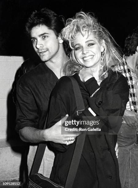 John Stamos and Teri Copley during Party For Hall & Oates - December 17, 1984 at Spago's Restaurant in Hollywood, California, United States.