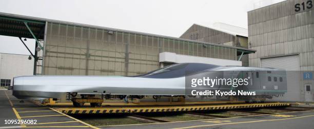 Photo shows the 22-meter nose-shaped front of the prototype No. 10 car of East Japan Railway Co.'s next-generation ALFA-X shinkansen bullet train,...