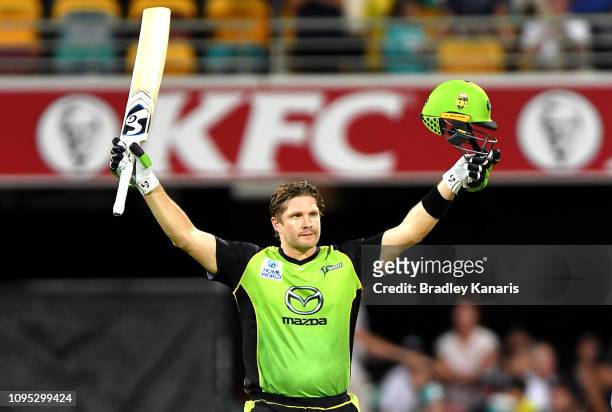 Shane Watson of the Thunder celebrates scoring a century of runs during the Big Bash League match between the Brisbane Heat and the Sydney Thunder at...