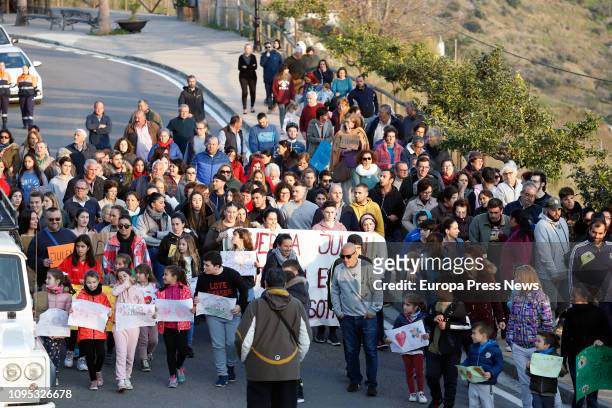 Neighbors gather to show their support for the family of toddler Julen Rosello, who fell down a well last Sunday, on January 17, 2019 in Málaga,...