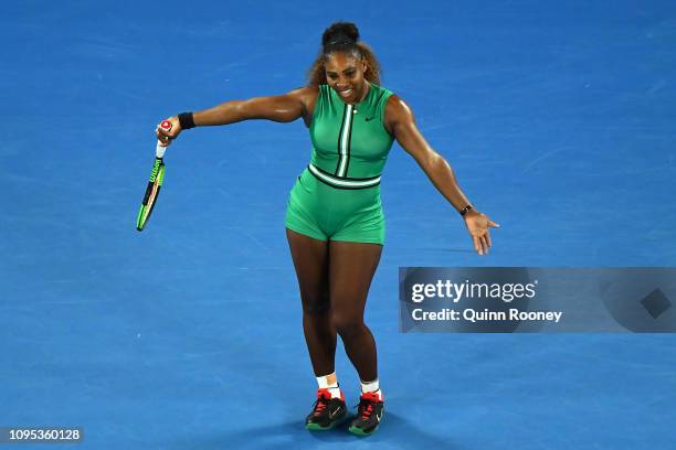 Serena Williams of the United States reacts after missing a shot in her second round match against Eugene Bouchard of Canada during day four of the...