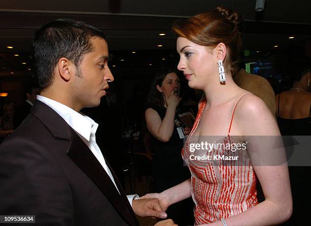 Jai Rodriguez and Anne Hathaway during Entertainment Industry Foundation's Colon Cancer Benefit on the QM2 - Green Room at Queen Mary 2 in New York...