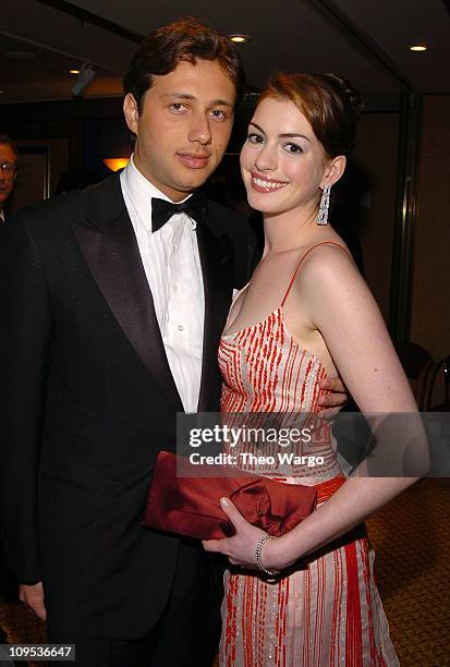 Anne Hathaway and guest during Entertainment Industry Foundation's Colon Cancer Benefit on the QM2 - Green Room at Queen Mary 2 in New York City, New...