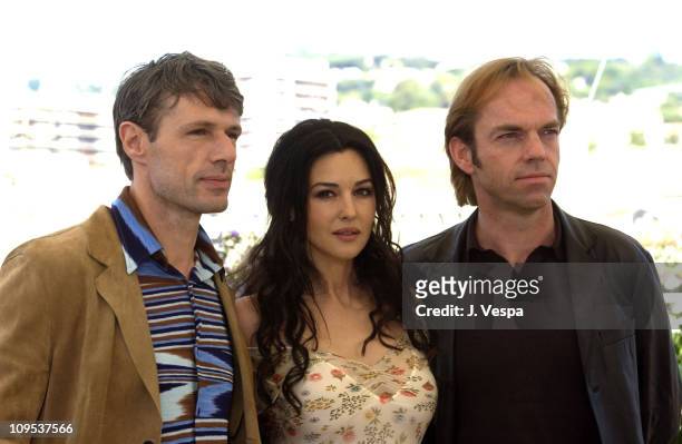 Lambert Wilson, Monica Bellucci, and Hugo Weaving during 2003 Cannes Film Festival - "Matrix Reloaded" Photo Call at Palais des Festivals in Cannes,...