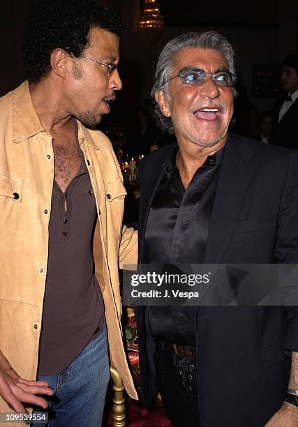 Lionel Richie and Roberto Cavalli during 2003 Cannes Film Festival - Roberto Cavalli Fashion Show - Dinner at Palm Beach in Cannes, France.