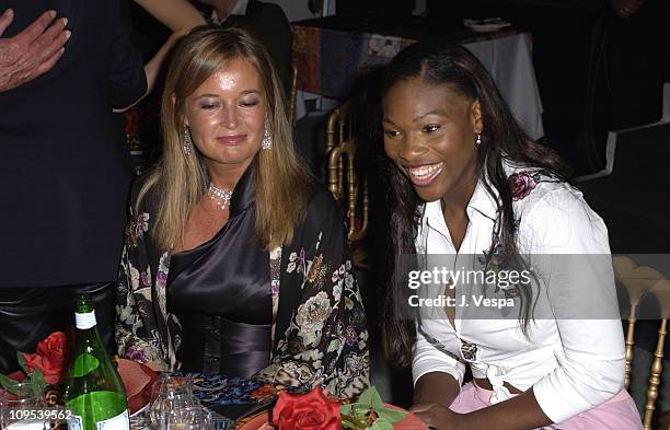 Eva Cavalli and Serena Williams during 2003 Cannes Film Festival - Roberto Cavalli Fashion Show - Dinner at Palm Beach in Cannes, France.