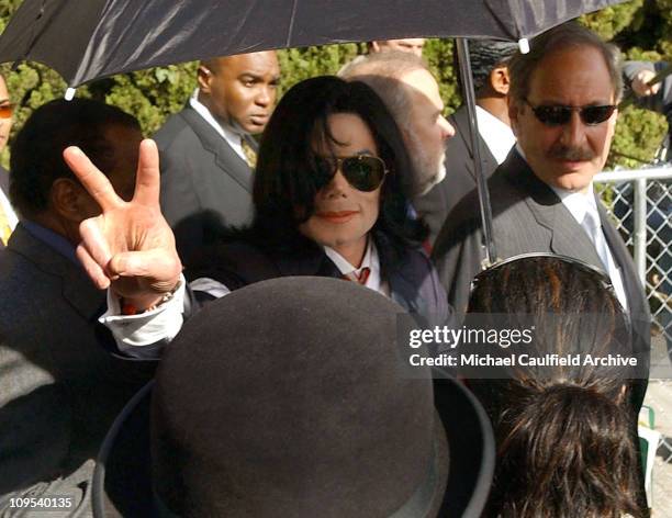 Michael Jackson leaves the Santa Maria Courthouse with his sister Janet Jackson and Mark Geragos Friday, Jan. 16, 2004.