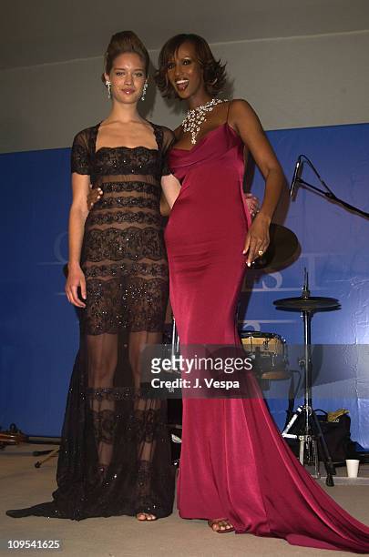 Julie Ordon and Iman both wearing DeBeers jewelry during 2003 Cannes Film Festival - Cinema Against Aids 2003 to benefit amfAR sponsored by Miramax -...