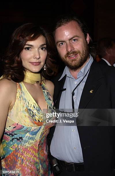 Laura Elena Harring and Paul Hills during 2003 Cannes Film Festival - Roberto Cavalli Fashion Show - Dinner at Palm Beach in Cannes, France.