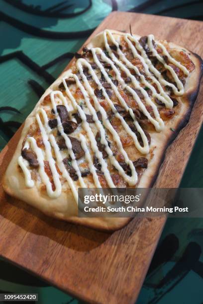 This image shows Nduja and bell pepper pizza at Beans Dough, 2A..., Fotografía de noticias