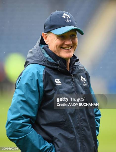 Ireland's coach Joe Schmidt smiles as he takes the captain's run training session at Murrayfield Stadium in Edinburgh, on February 8 on the eve of...