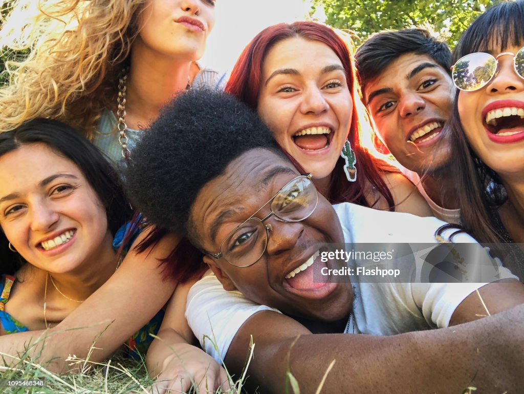 Friends Having Fun Taking Group Selfies With Smart Phone High Res Stock 
