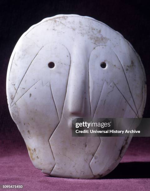 Native Indian carved anthropomorphic object; Bone. Decorated, Eskimo, . Canada 1909.