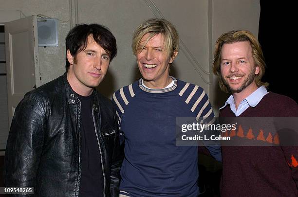 Trent Reznor, David Bowieand David Spade seen backstage at BOWIE's first concert visit to Los Angeles in nearly seven years. It was the first of four...