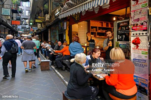 Pedestrian and dinners at Melbourne cafe and restaurant Centre Place Lane in Melbourne Victoria, Australia.