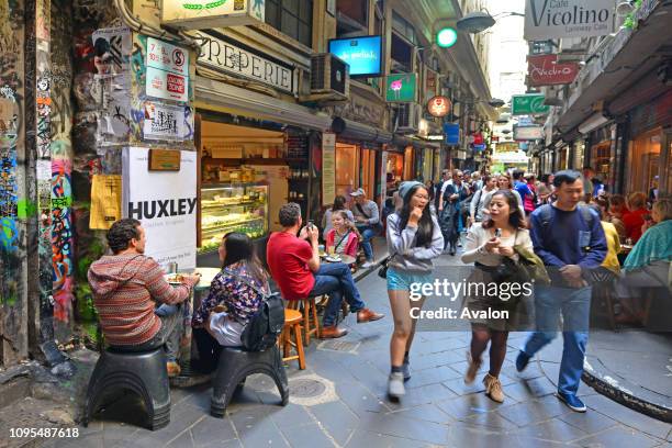 Pedestrian and dinners at Melbourne cafe and restaurant Centre Place Lane in Melbourne Victoria, Australia.