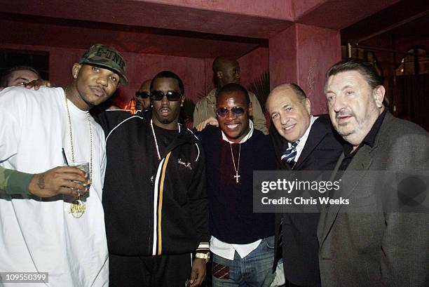 Diddy and Andre Harrell during PlayStation 2 Pre-Grammy Party Hosted by Pharrell at The Spider Room in Hollywood, California, United States.