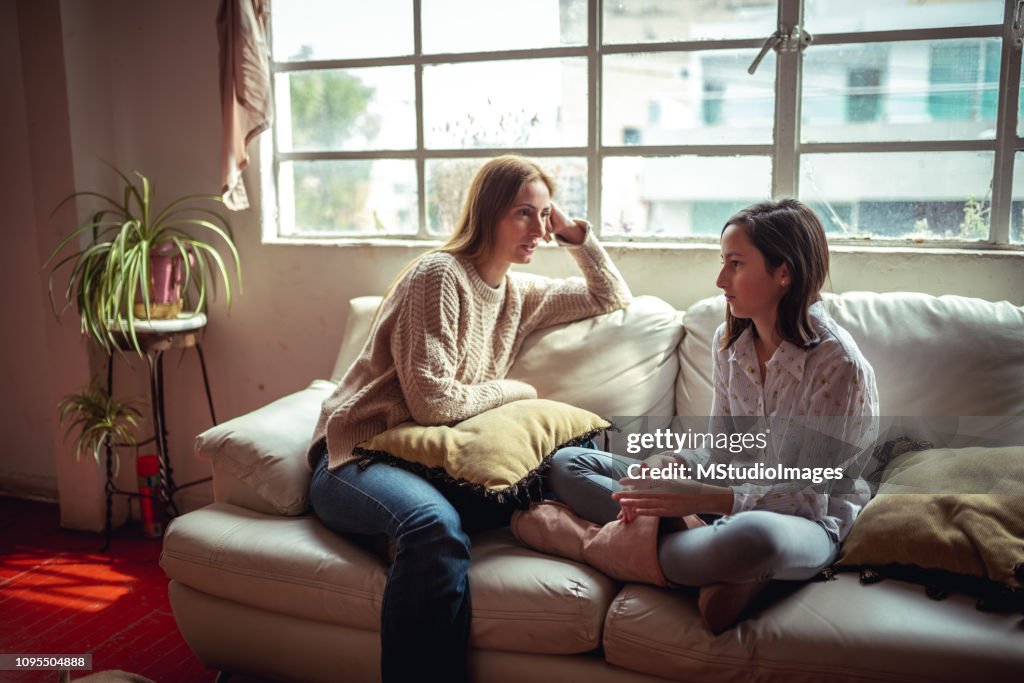 Mother and daughter having a talk.