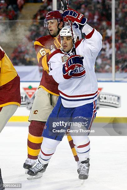 Scott Gomez of the Montreal Canadiens skates against the Calgary Flames on February 20, 2011 during the 2011 Heritage Classic at McMahon Stadium in...