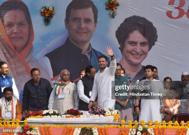 Congress president Rahul Gandhi waves during a farmers rally Aabhar Sammelan at Jamburi Maidan, on February 8, 2019 in Bhopal, India. Rahul again...