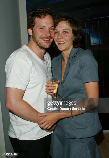 Peter Sarsgaard and Maggie Gyllenhaal during Bradley Bayou / Halston Fall 2003 Collection - LA Launch at Saks Fifth Avenue in Beverly Hills,...