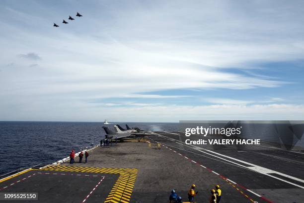French Rafale fighter jet lands on the "Charles de Gaulle" aircraft carrier on February 7, 2019 in the mediterranean sea.