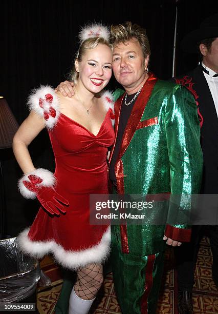 Brian Setzer and and his guest Julie backstage at TNT's "Christmas in Washington" Concert to air Sunday, December 15 at 8pm ET/PT, live from the...