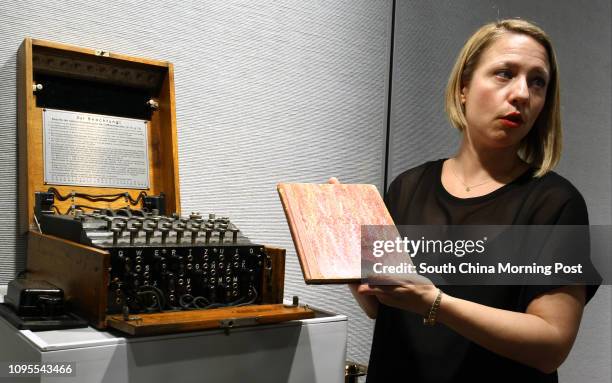 Cassandra Hatton, director, History of science and technology of Bonhams hold a key handwritten scientific document by father of computers Alan...