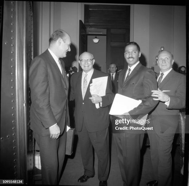 View of, from left, United States Attorney General Nicholas Katzenbach with US Congressmen Emanuel Celler , John Conyers, and Herbert Tenzer as they...