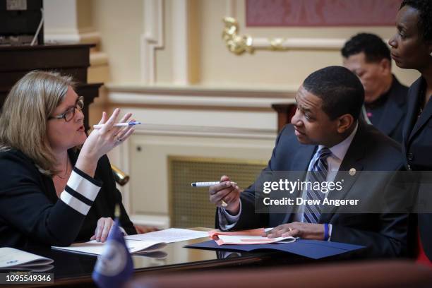 Tara Perkinson, chief deputy clerk of the Virginia State Senate, speaks with Virginia Lt. Governor Justin Fairfax on the Senate floor at the Virginia...