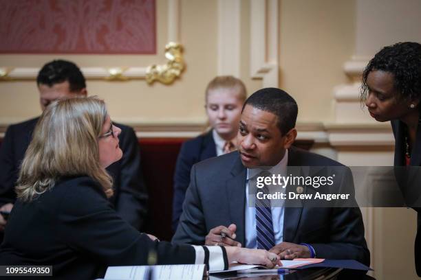 Tara Perkinson, chief deputy clerk of the Virginia State Senate, speaks with Virginia Lt. Governor Justin Fairfax on the Senate floor at the Virginia...