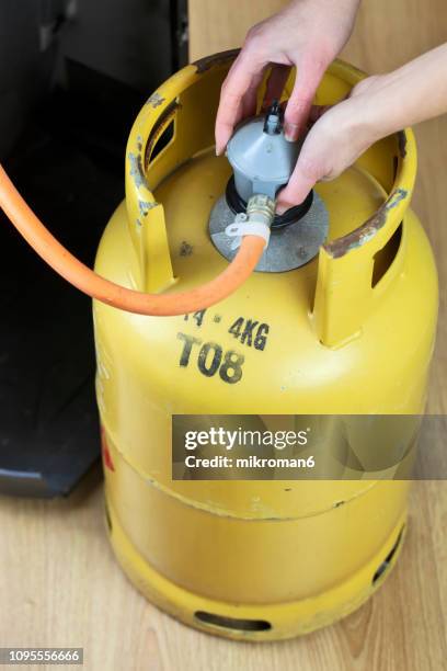 lpg gas bottle, butane gas cylinders - lpg-installation stock pictures, royalty-free photos & images
