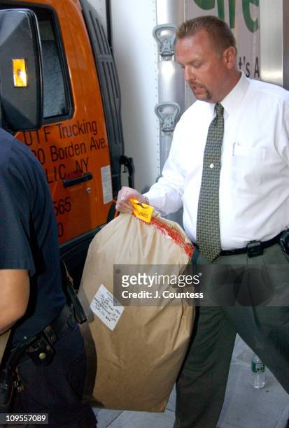 New York City Police Detectives and Crime Scene Investigators depart the residence of Eric Douglas. Eric Douglas was found dead in his apartment in...