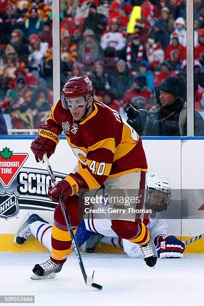 Alex Tanguay of the Calgary Flames skates against the Montreal Canadiens on February 20, 2011 during the 2011 Heritage Classic at McMahon Stadium in...