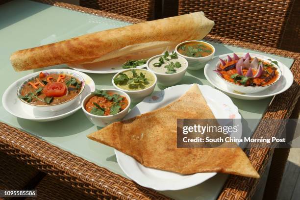 This image shows Mysore masala dosa ,Kadai paneer Panjabi , Mushroom roganjosh and Ghee roast masala dosa at the Saravanaa Bhavan, 4/f, Ashely...