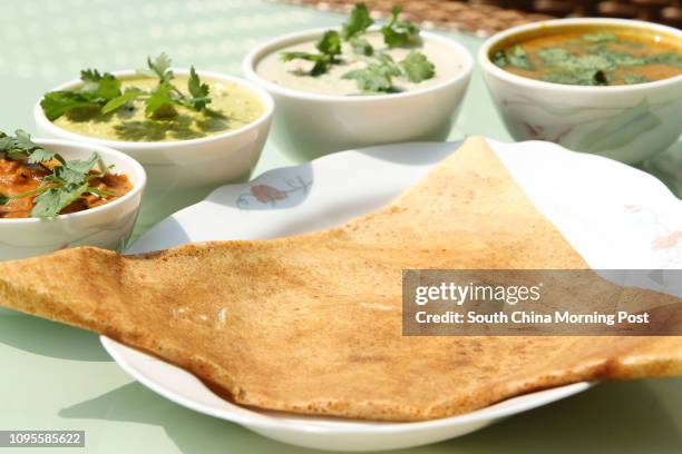 This image shows Mysore masala dosa at the Saravanaa Bhavan, 4/f,..., News Photo