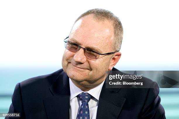 Mark Cutifani, chief executive officer of AngloGold Ashanti Ltd., listens during an interview at the BMO Capital Markets Global Metal & Mining...