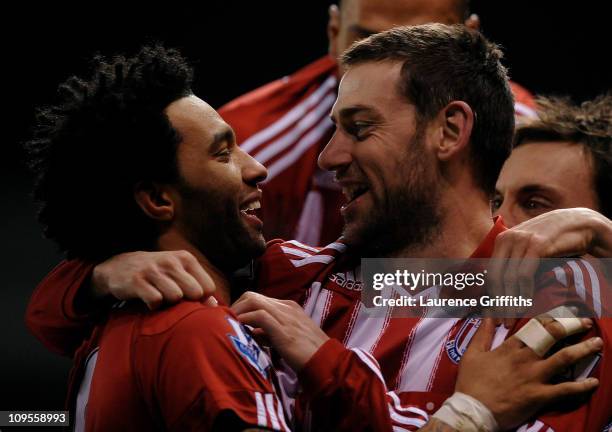 Rory Delap of Stoke City celebrates scoring the opening goal with team mate Jermaine Pennant during the Barclays Premier League match between Stoke...