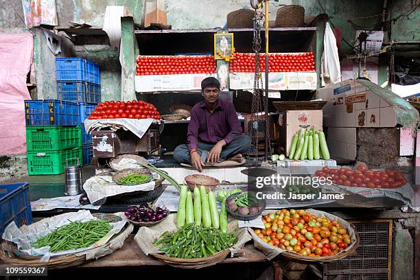 man selling vegetables at street market in mumbai, - mumbai bildbanksfoton och bilder