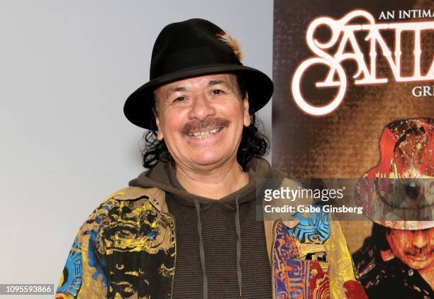 Recording artist Carlos Santana poses after making a donation at Spread the Word Nevada on January 17, 2019 in Henderson, Nevada.