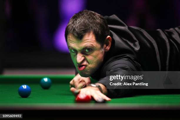 Ronnie O'Sullivan of England plays a shot during his quarter-final match against Ryan Day of Wales on day five of the 2019 Dafabet Masters at...