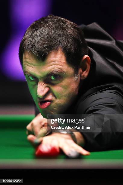 Ronnie O'Sullivan of England plays a shot during his quarter-final match against Ryan Day of Wales on day five of the 2019 Dafabet Masters at...