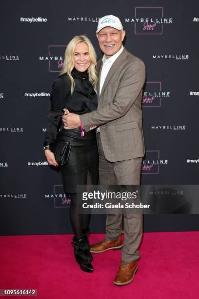 Axel Schulz and his wife Patricia attend the Maybelline New York show 'Make-up that makes it in New York' during the Berlin Fashion Week...