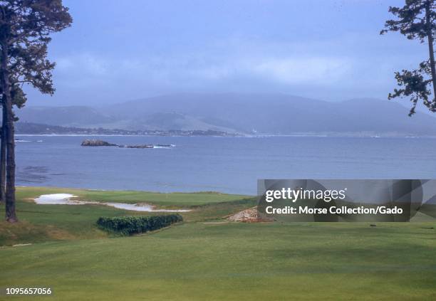 Panoramic view facing southwest of Pebble Beach Golf Club in Carmel, Monterey, California, June, 1950. At left are the Pescadero Rocks in Stillwater...