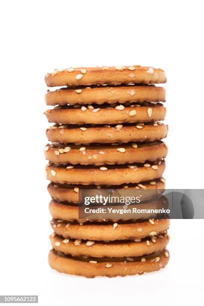 stack of biscuit cookies stack isolated on white background - crackers stock-fotos und bilder